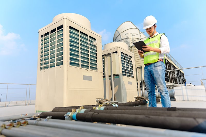 inspection by technician of a commercial unit.